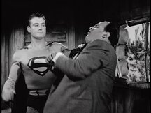 Superman grabs Cranek