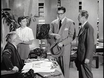 Lois, Perry, Clark, and Hadley in Perry's office